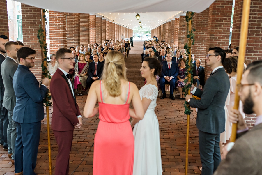A couple getting married outside at the shambles in south Philadelphia.